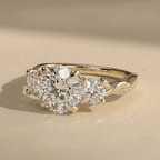 Round center stone twisted gold engagement ring