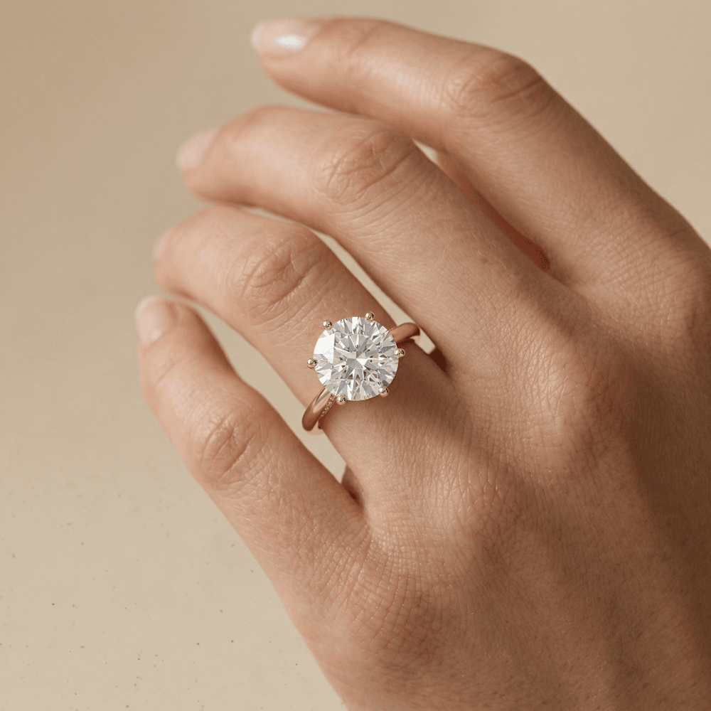 Elegant round lab diamond wedding ring in yellow gold