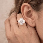 Round moissanite cathedral halo ring lifestyle photo