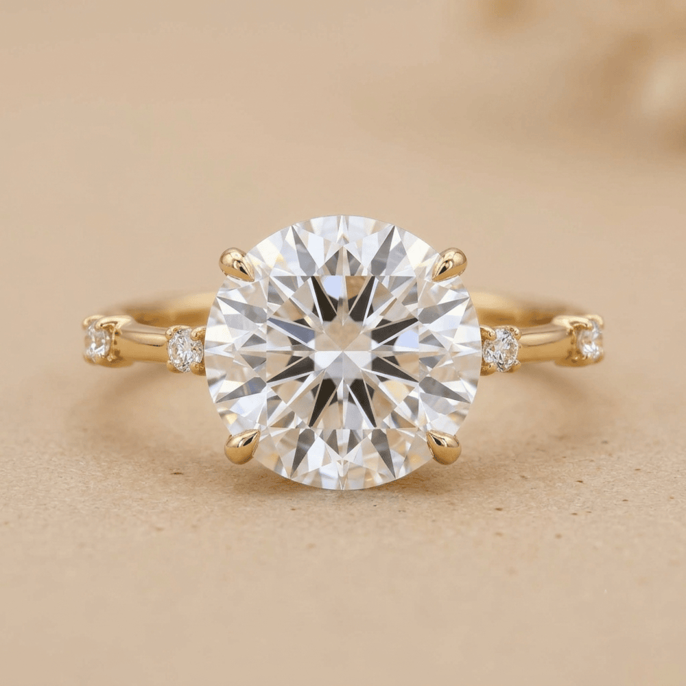 Round moissanite engagement ring in 14K yellow gold thin band
