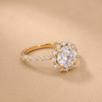Floating halo design on round cut moissanite ring