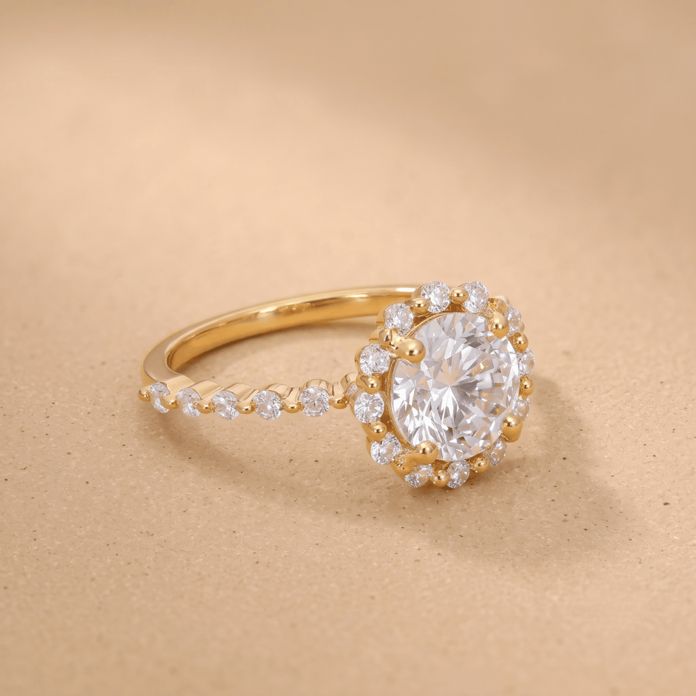 Floating halo design on round cut moissanite ring