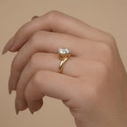 14K gold moissanite ring with sleek curved band detail