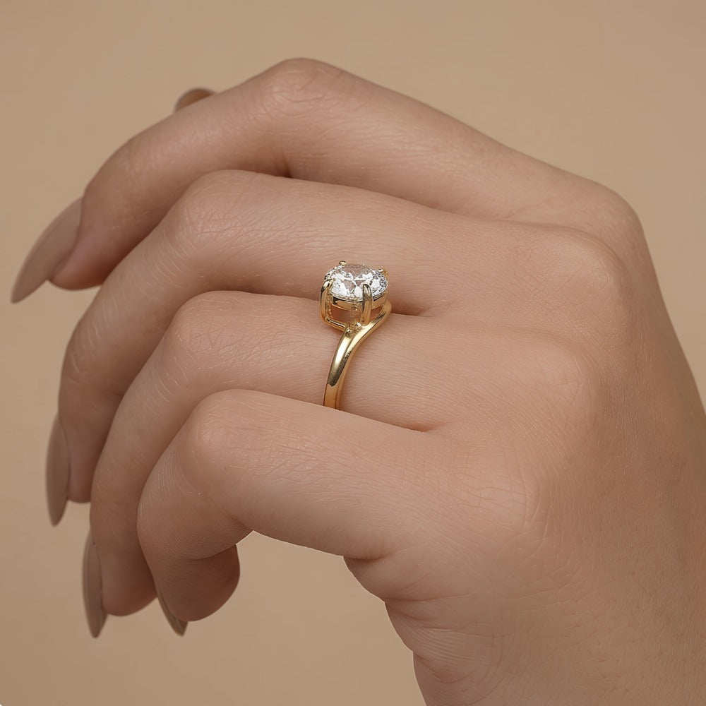 14K gold moissanite ring with sleek curved band detail