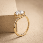 Side profile of 14K gold curved band moissanite solitaire ring