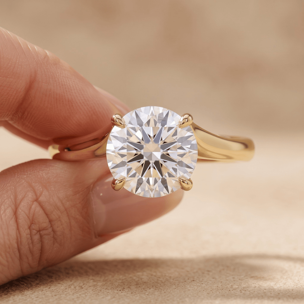 14K gold curved band ring on hand, round moissanite detail