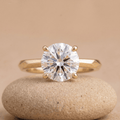 Round solitaire engagement ring in 14K gold