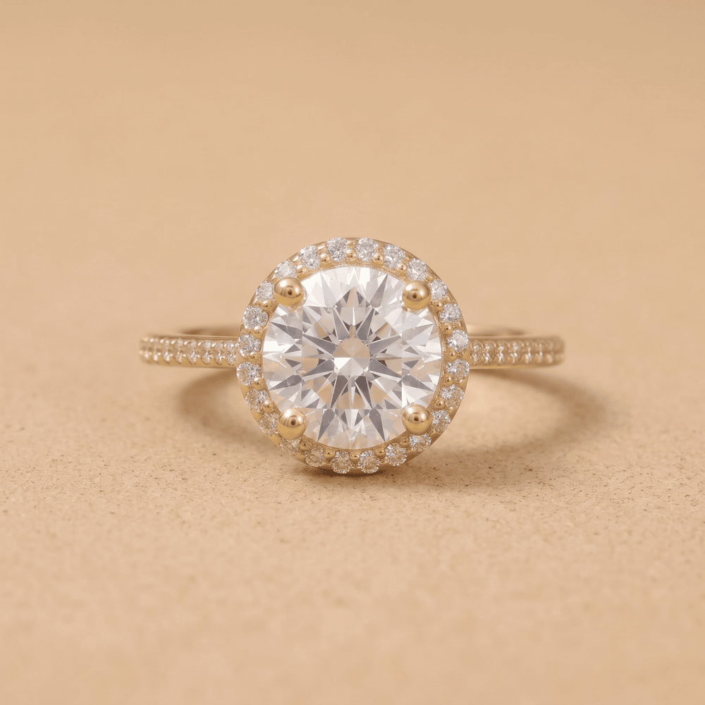 Round halo moissanite engagement ring in 14K gold