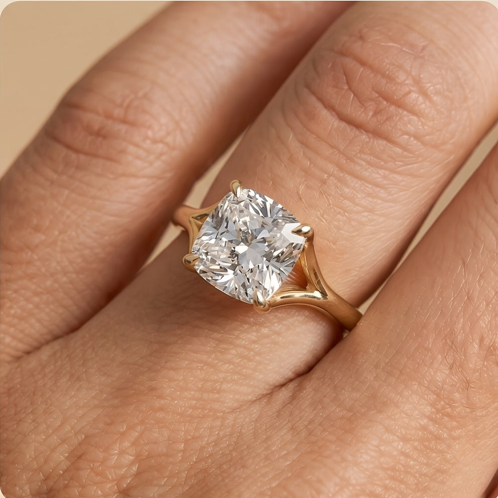Ethical cushion moissanite ring on model's hand