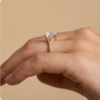 Ethical cushion moissanite ring on model's hand