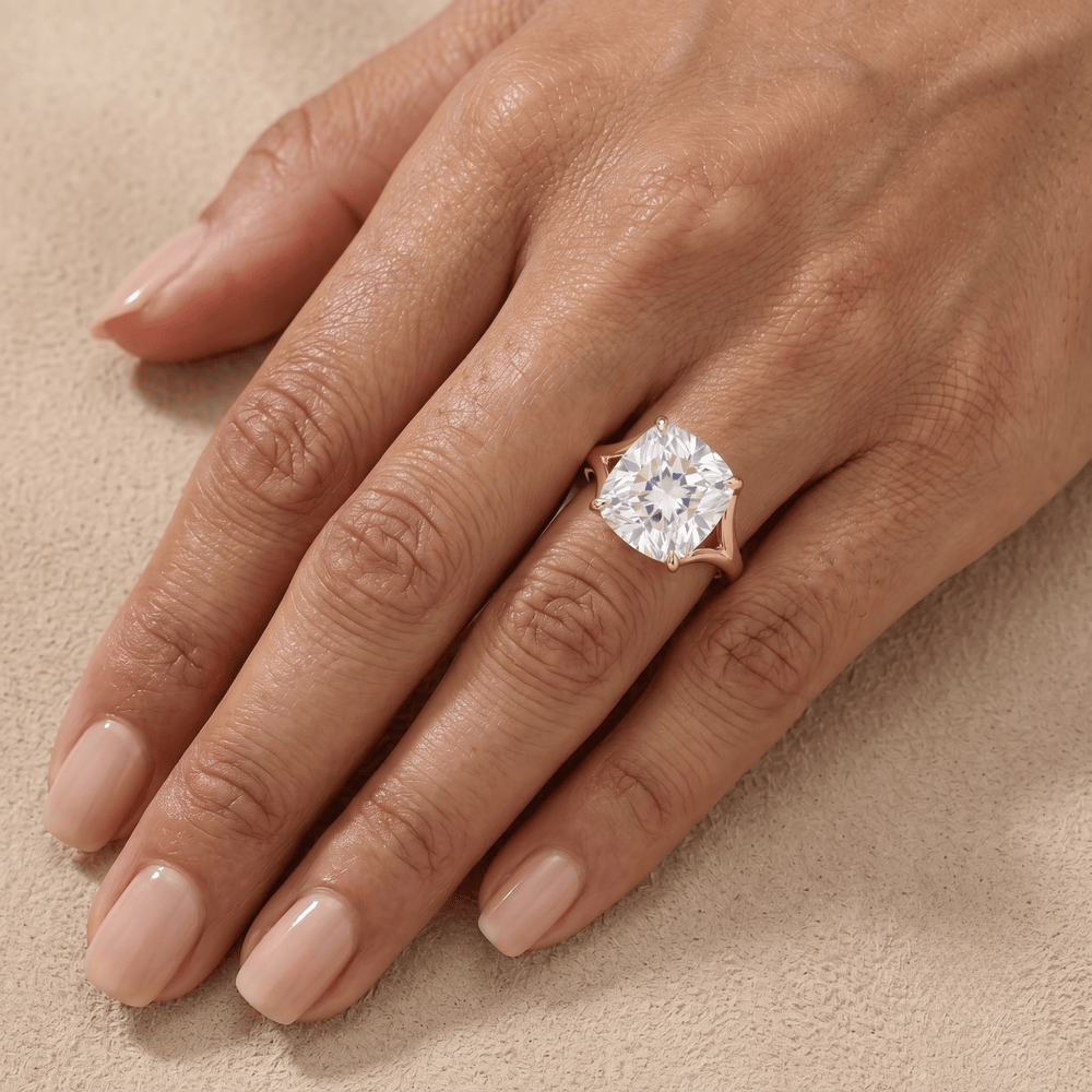 Ethical cushion moissanite ring on model's hand