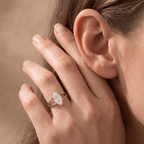 Marquise moissanite 14K gold ring worn on finger lifestyle photo