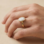 Solitaire bezel oval ring with matching wedding band