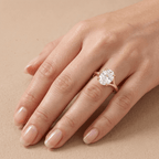 Ethically sourced solitaire oval diamond ring on model's hand