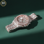 Luxury diamond-encrusted watch on a green background with JBR Jewellers logo.