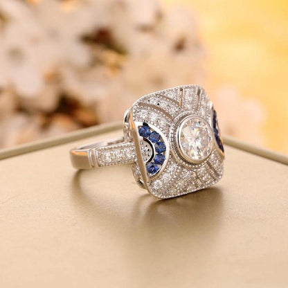 Art Deco 0.80CT Round Cut White Gold Sapphire Accents Moissanite Engagement Ring - JBR Jeweler