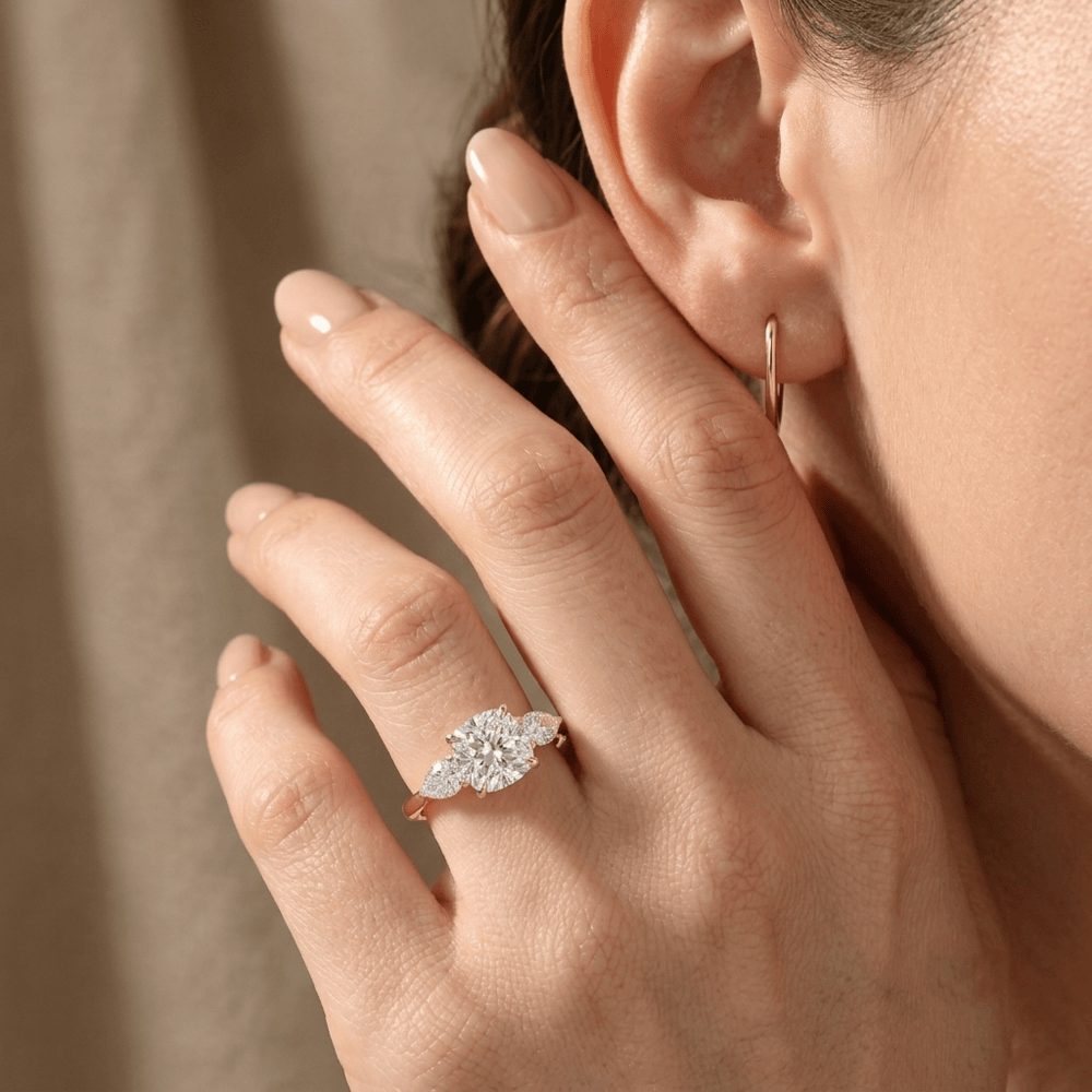 Cushion center stone engagement ring with moissanite accents