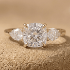 Cushion moissanite three stone engagement ring in 14K gold