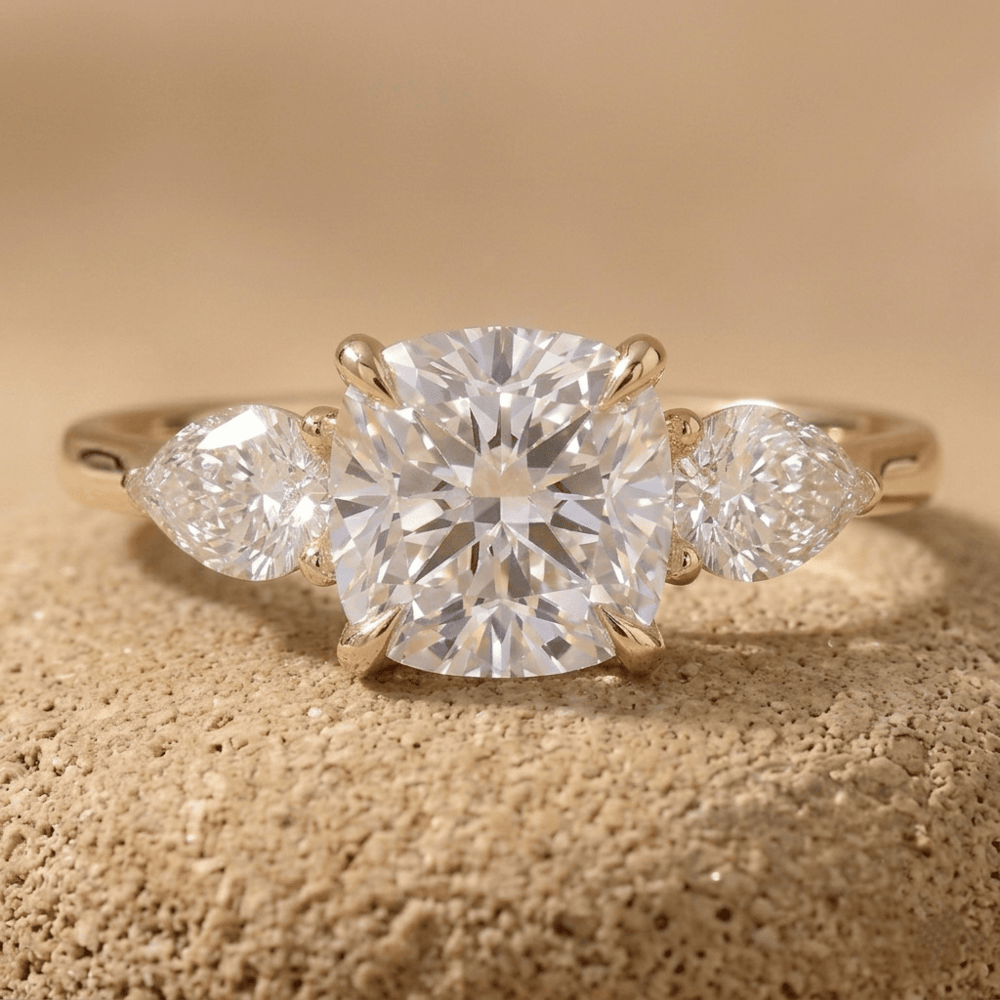 Cushion moissanite three stone engagement ring in 14K gold