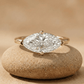 East west marquise moissanite engagement ring in 10K yellow gold