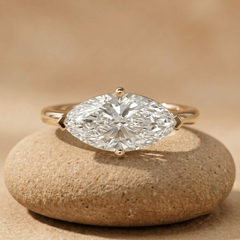 East west marquise moissanite engagement ring in 10K yellow gold