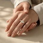Marquise solitaire engagement ring with yellow gold band