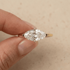 Minimalist marquise moissanite ring in solid yellow gold