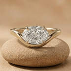 Oval east west moissanite ring in 14K yellow gold wave band