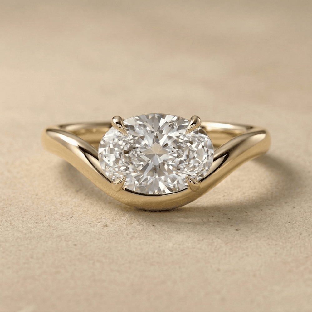 14K yellow gold oval moissanite solitaire ring with wave band