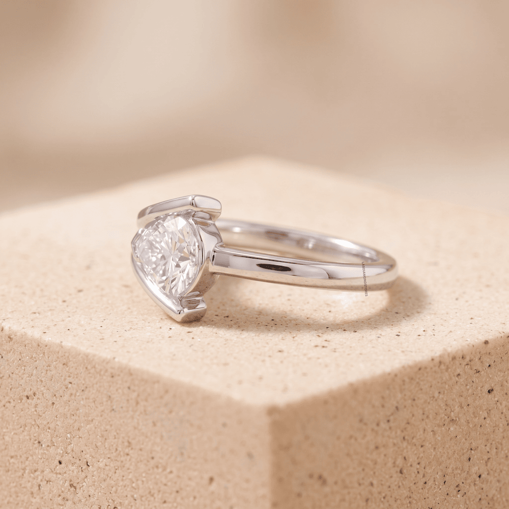 Side View of 14K White Gold Pear Moissanite Ring