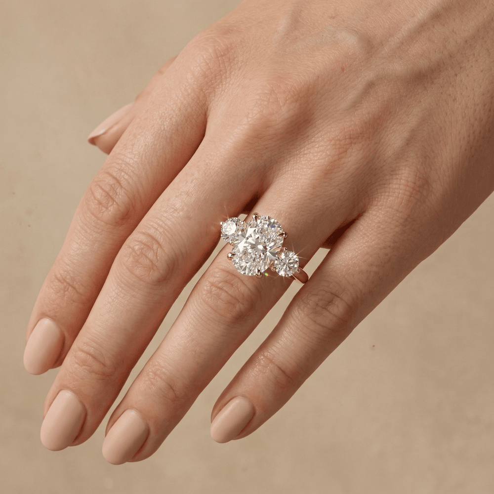Cushion cut moissanite ring with side stones