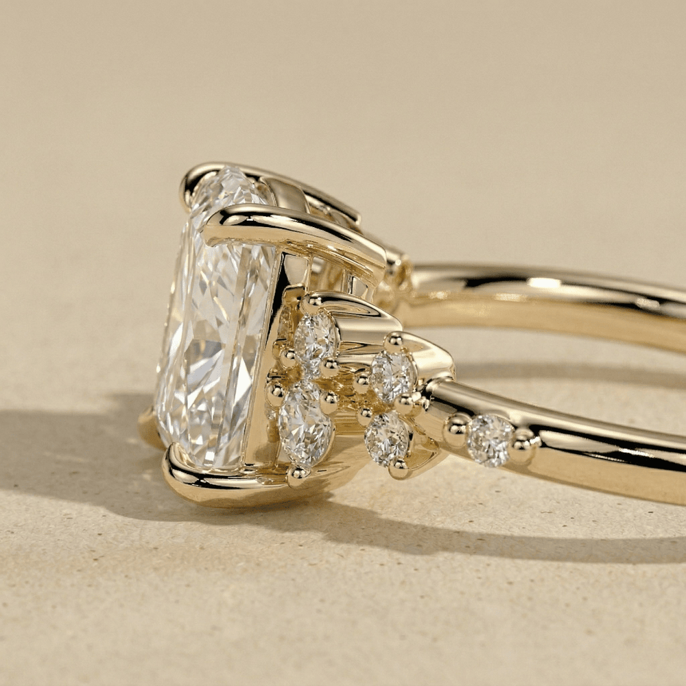 Emerald cut moissanite ring side view