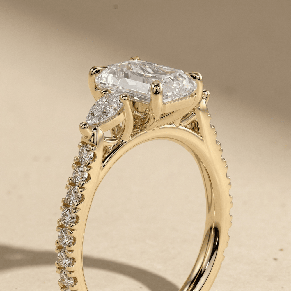 14kt gold emerald cut moissanite bridal ring