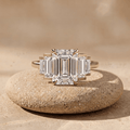 Emerald and baguette moissanite three stone promise ring
