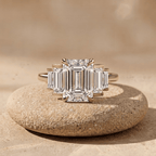Emerald and baguette moissanite three stone promise ring