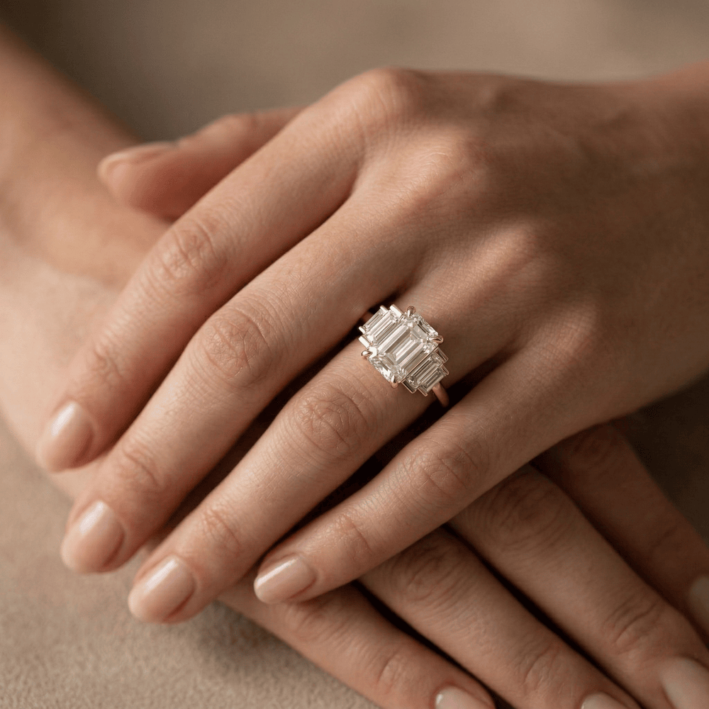 Emerald cut moissanite bridal ring with baguette moissanite