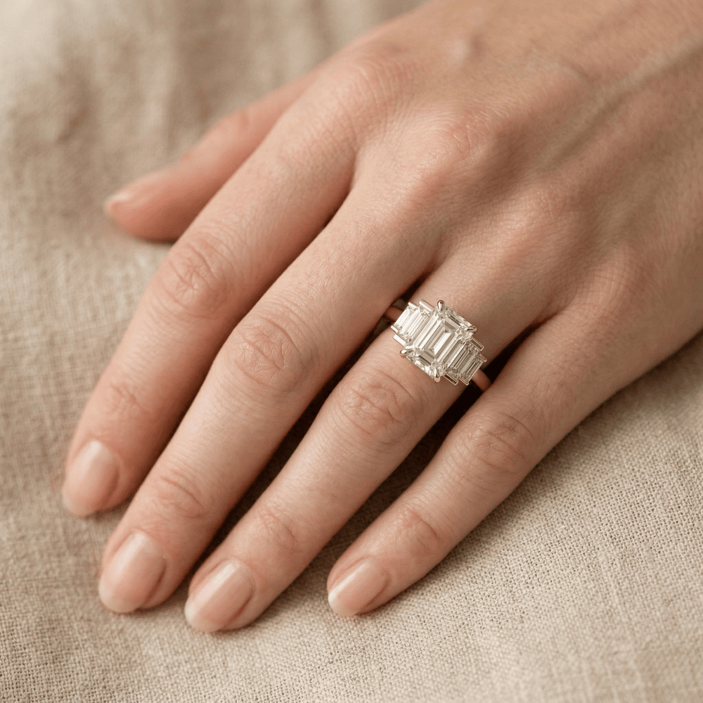 Modern emerald and baguette moissanite ring