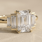 Emerald cut moissanite promise ring with baguette side stones