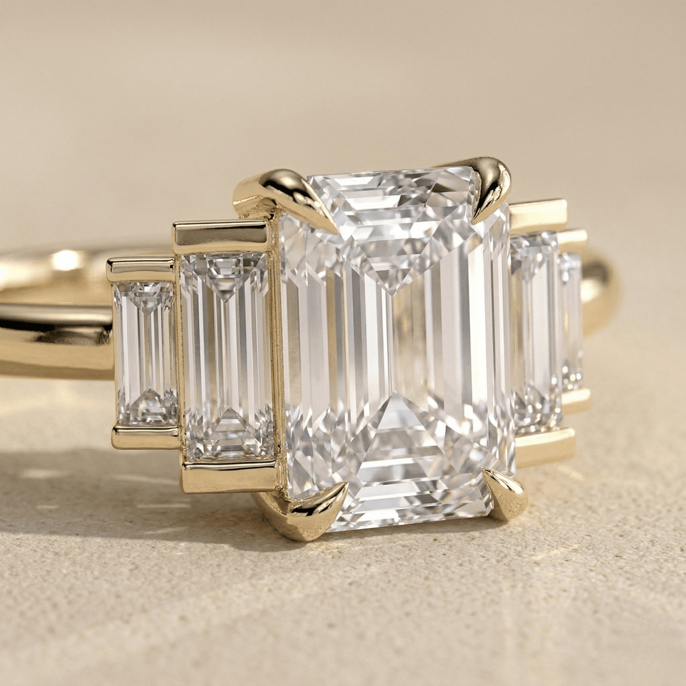 Emerald cut moissanite promise ring with baguette side stones