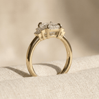 Emerald cut moissanite ring with tapered baguette side stones