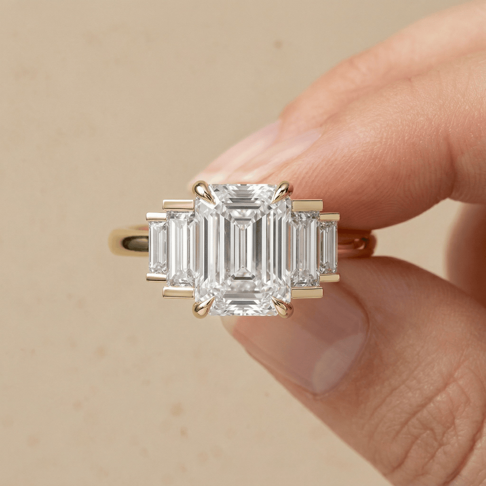 Elegant emerald and baguette moissanite ring for her