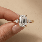 14K gold emerald cut moissanite three stone engagement ring