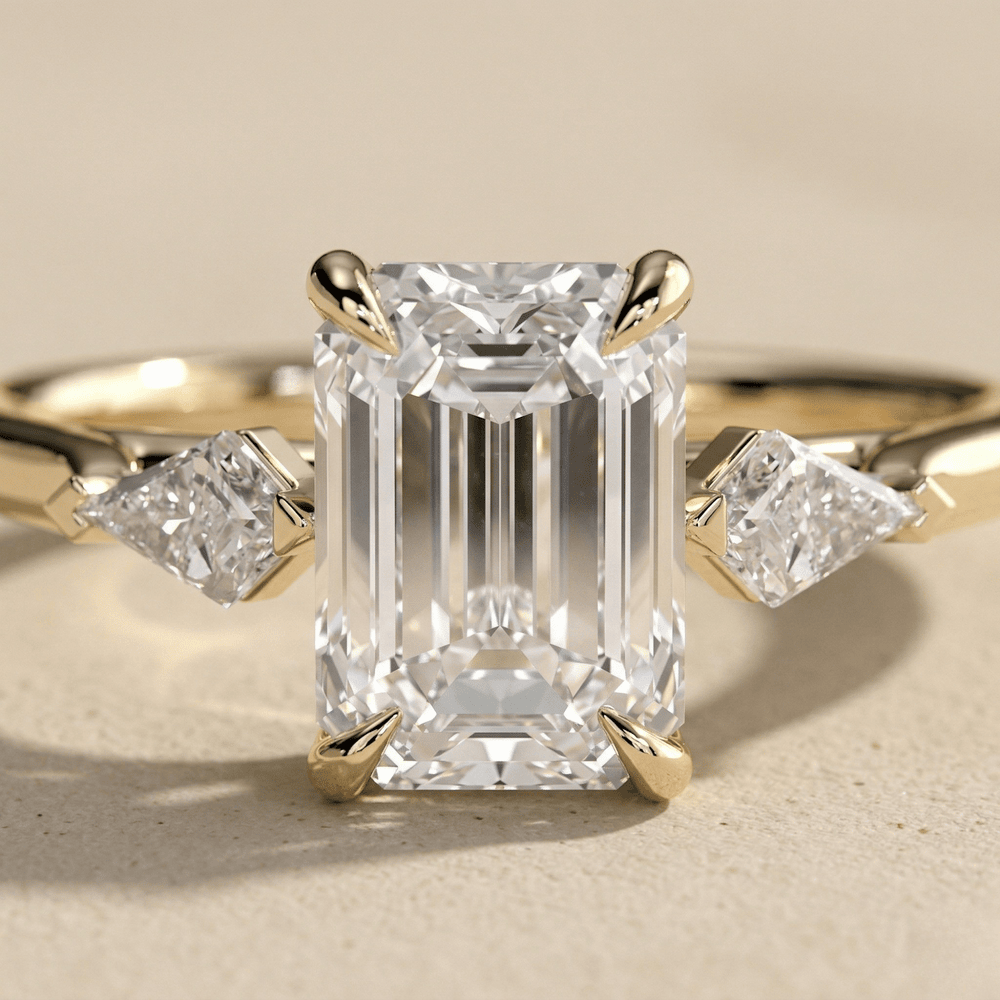 Emerald cut center moissanite ring with matching side stones