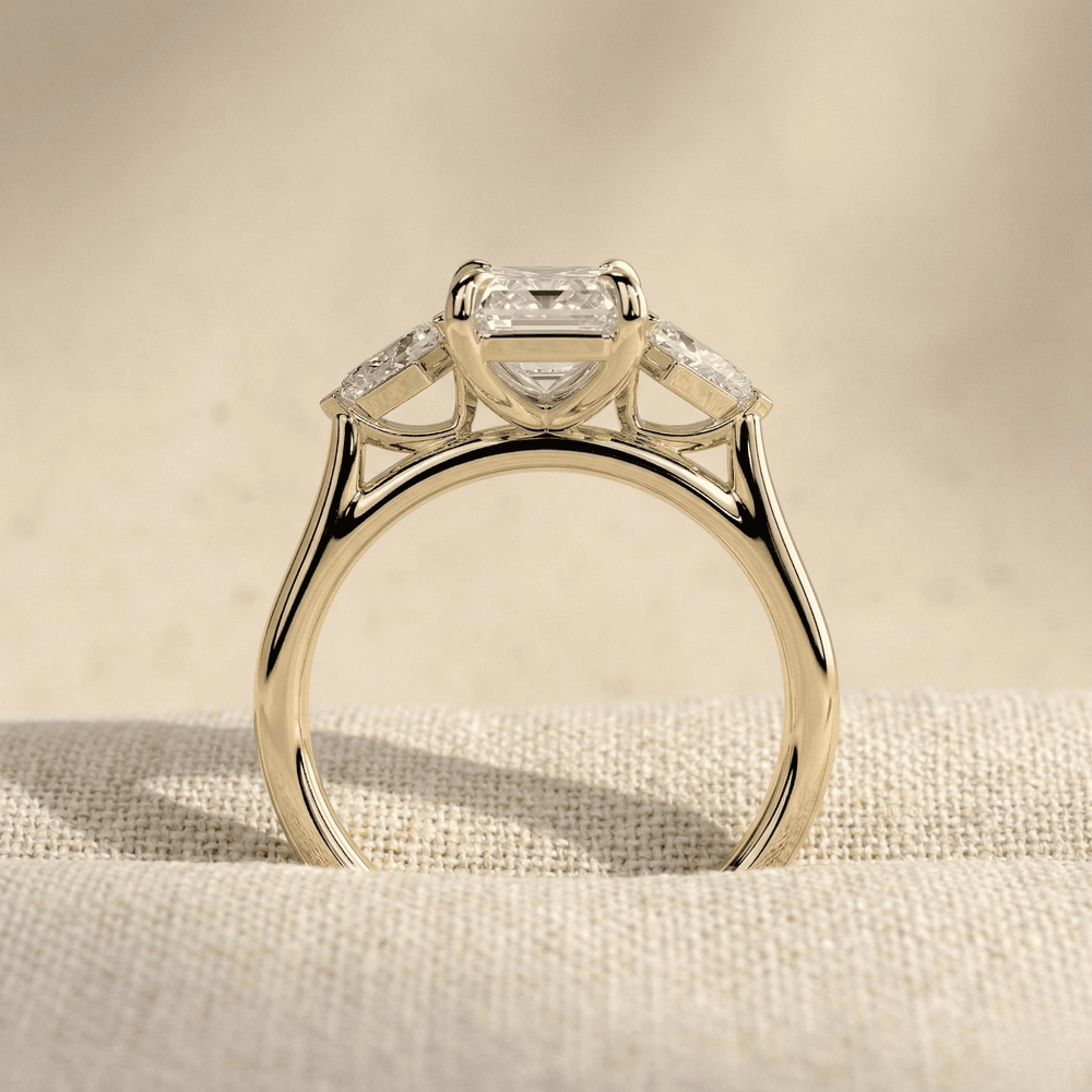 Elegant emerald cut moissanite bridal ring in gold
