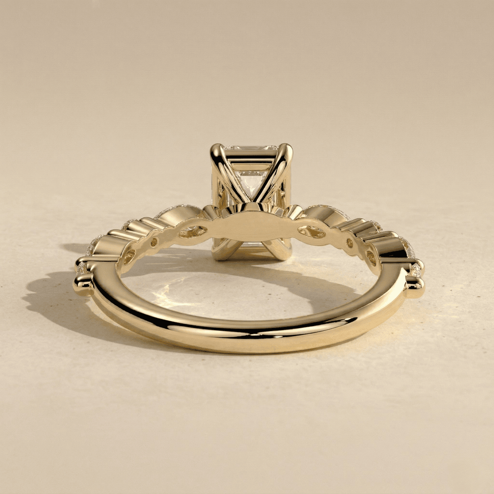 Emerald moissanite cluster engagement ring in rose gold