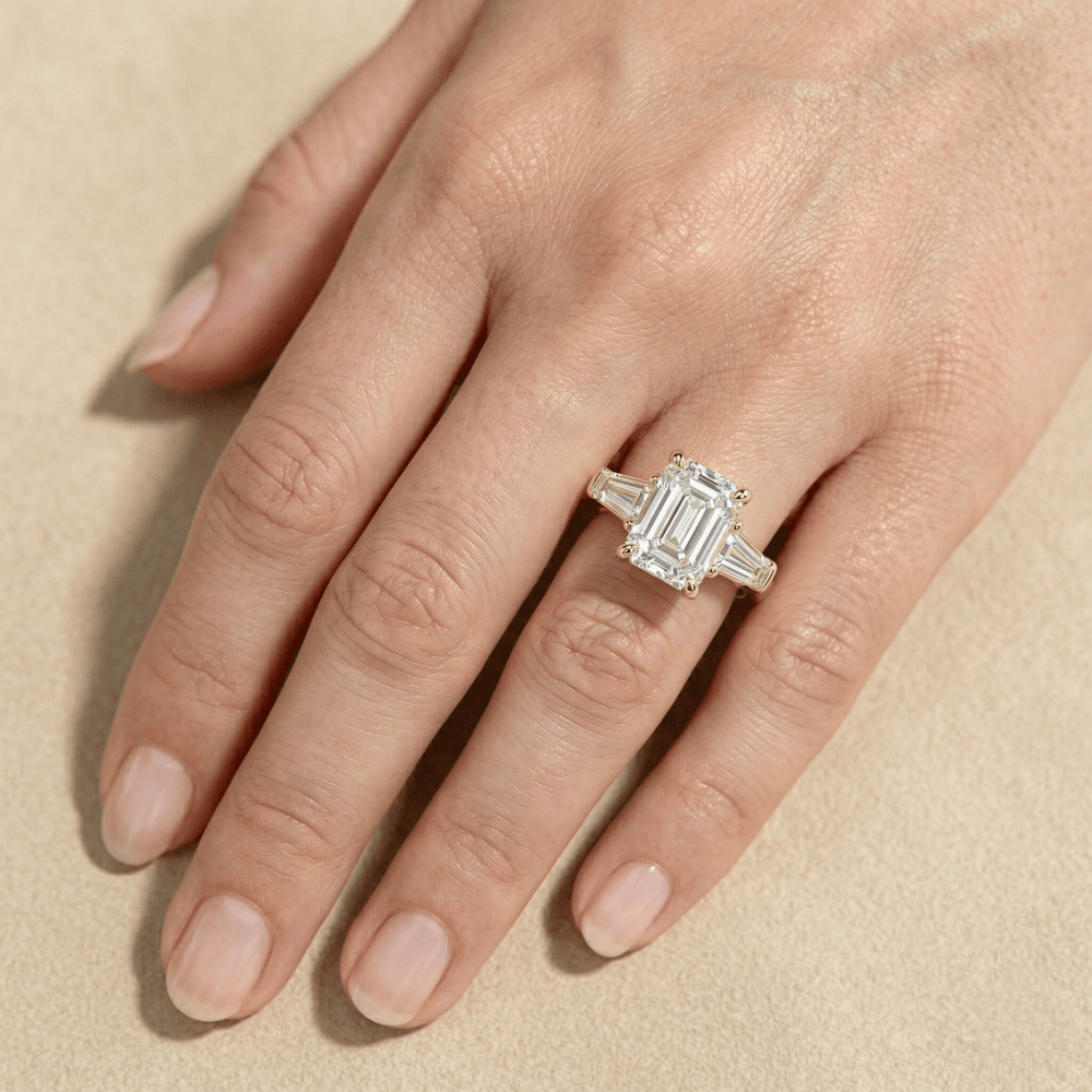 Emerald cut moissanite bridal jewelry in gold