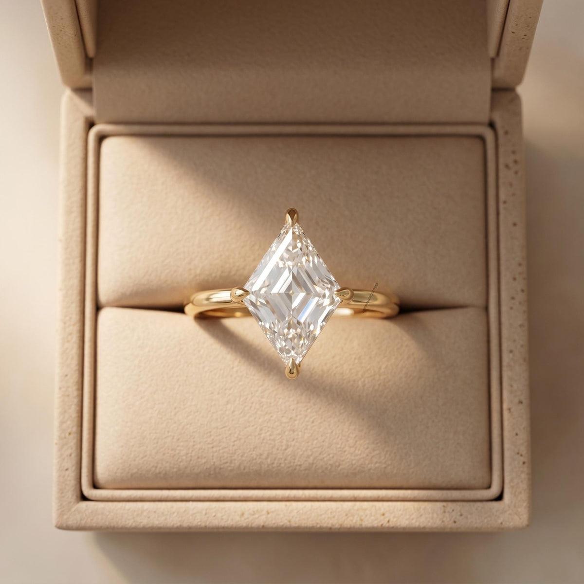 Minimalist gold diamond solitaire