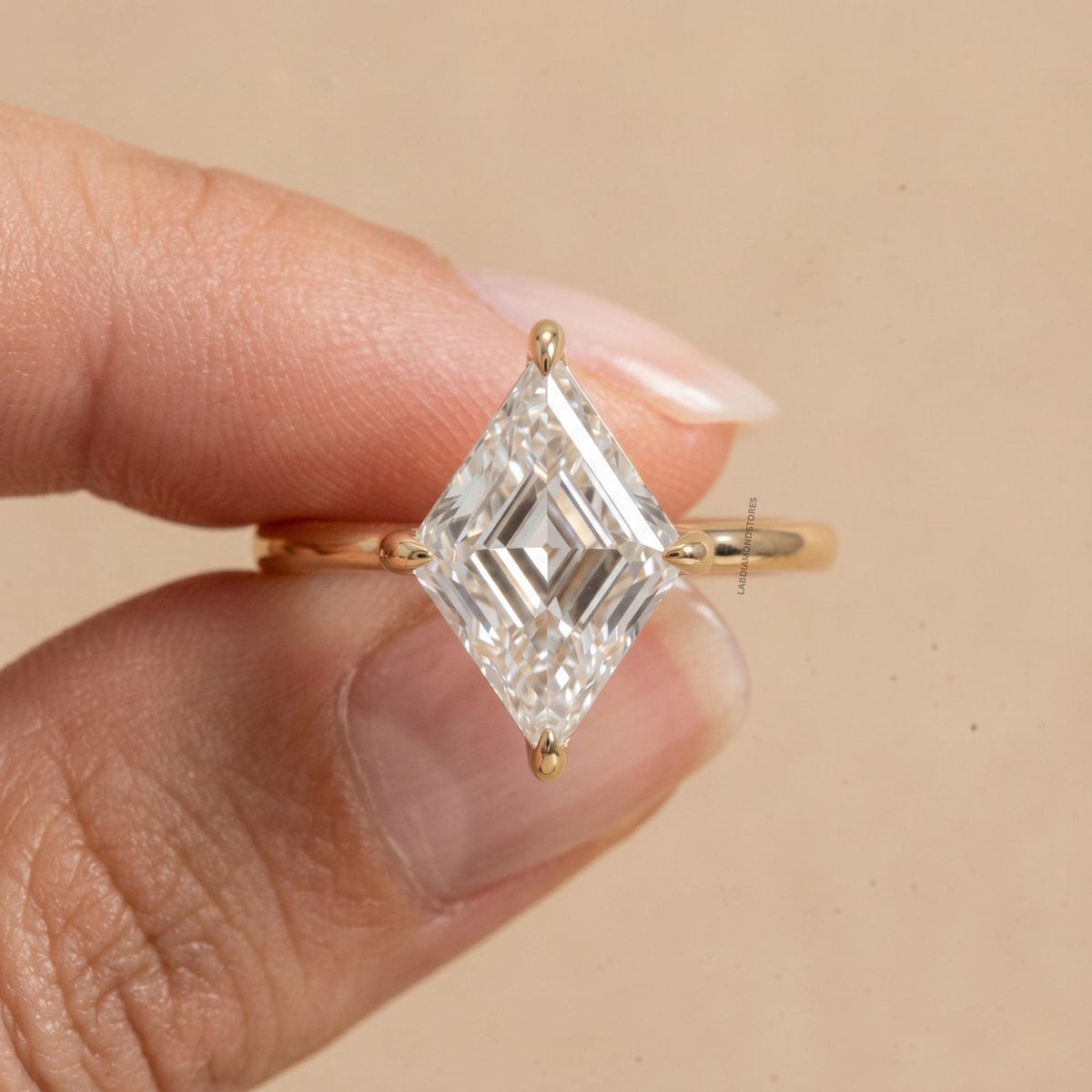 Lab grown diamond lozenge cut gold ring