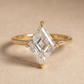 Lozenge cut lab diamond solitaire engagement ring