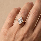 Unique lozenge cut diamond ring
